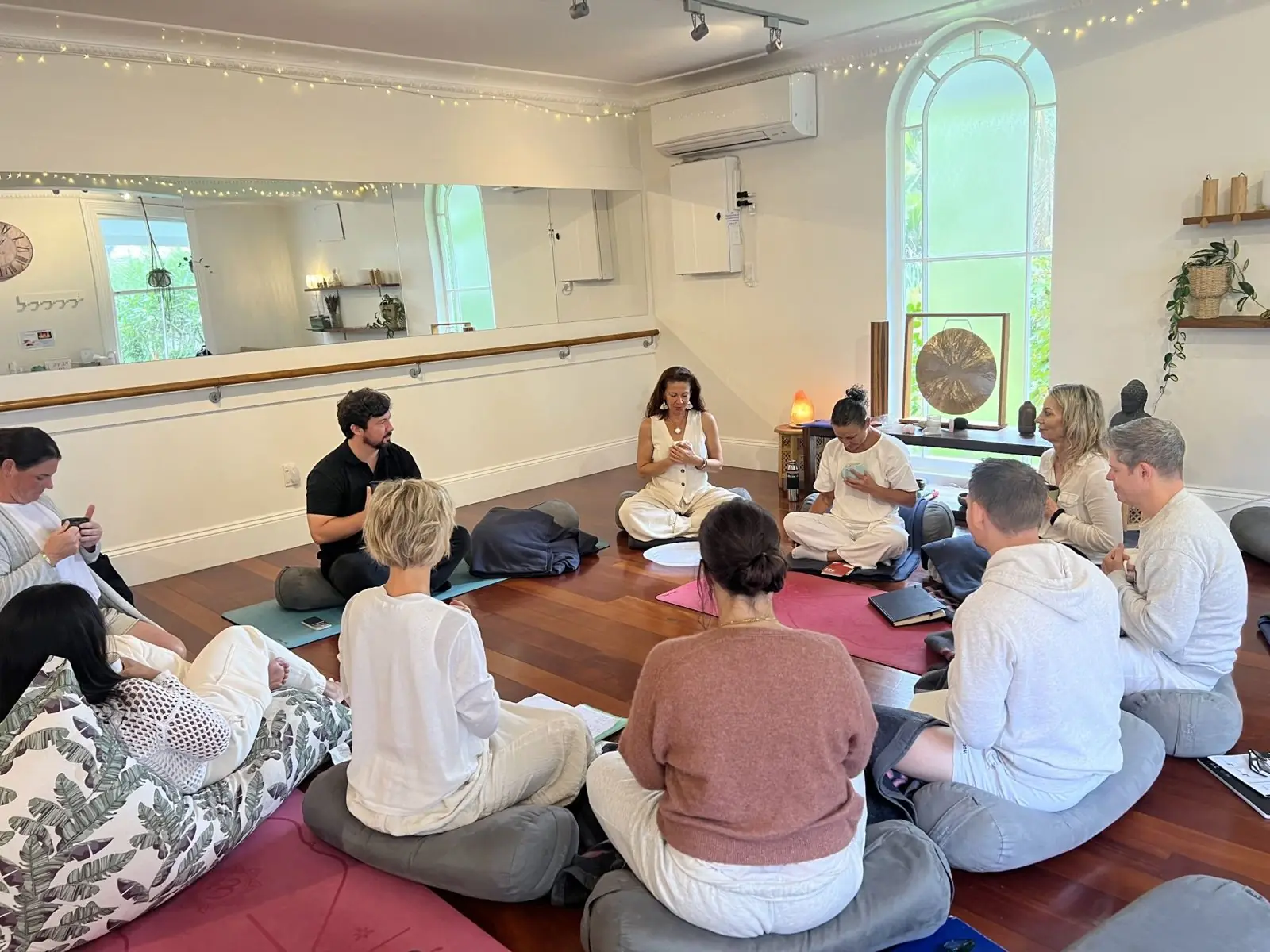 Participants sitting in pairs during a Sensory Energetics training