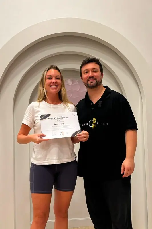 Dr. Daniel Flash with a new facilitator and her certificate