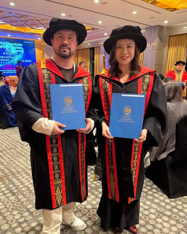 Dr. Daniel Flash celebrating his doctorate