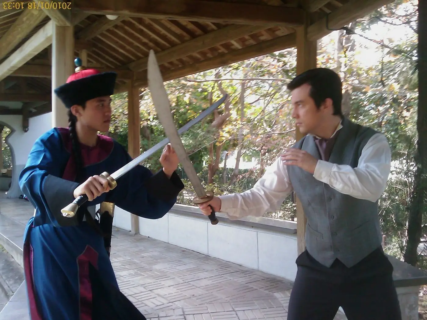 Daniel Flash in a sword fight scene on an Asian film set