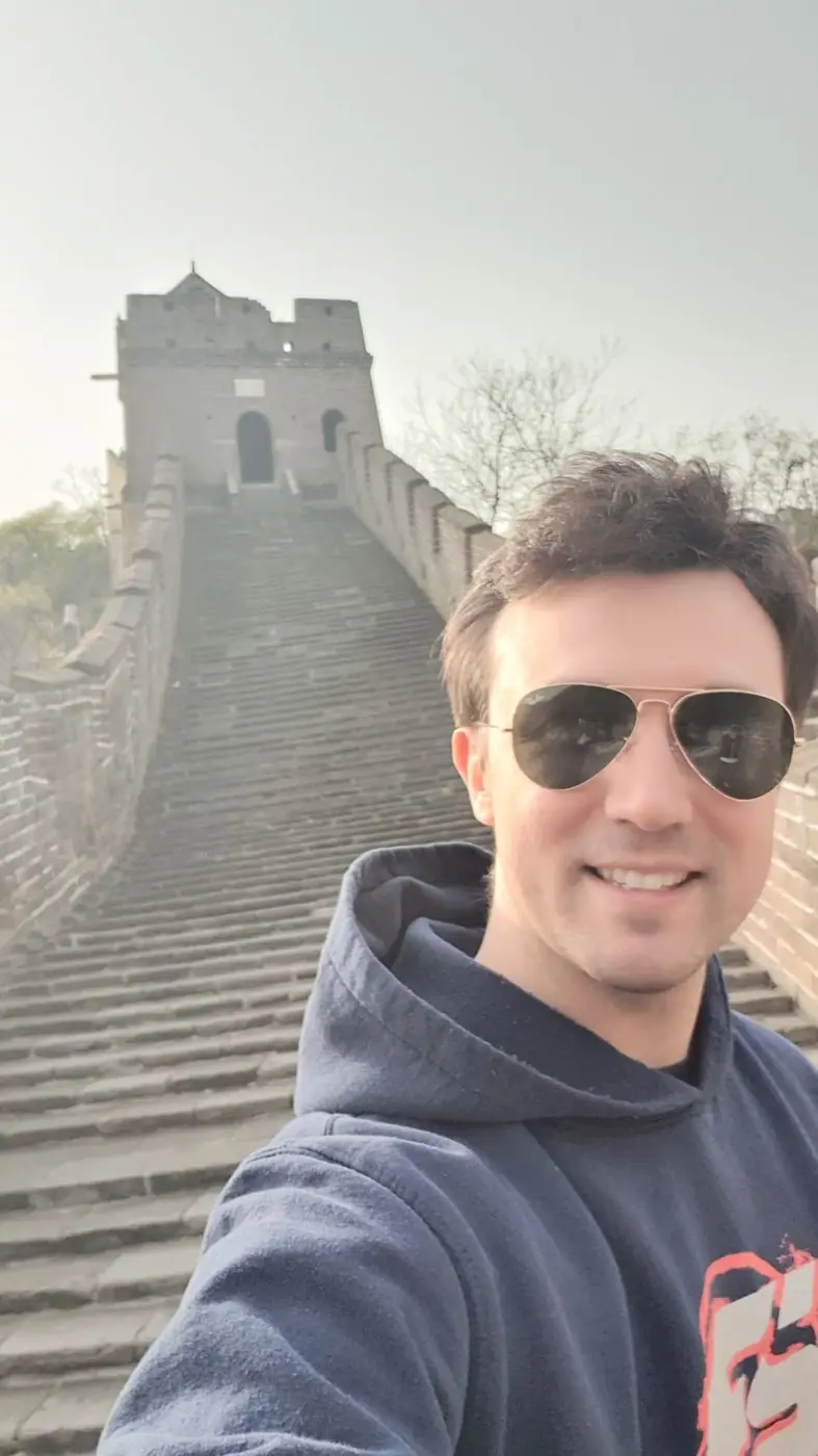 Daniel Flash taking a selfie on the Great Wall of China