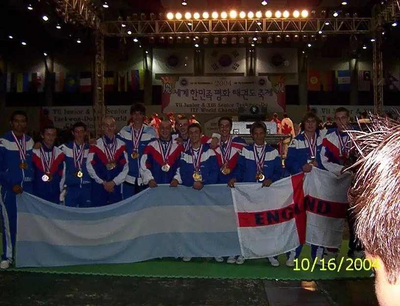 Argentine martial arts team lined up with the Argentine flag at an international championship